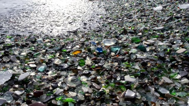 Glass pebbles on beach