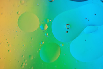Rainbow abstract defocused background picture made with oil, water and soap