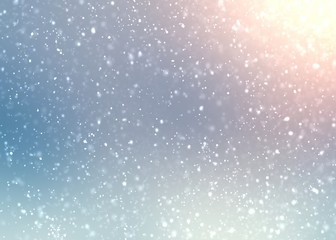 Winter sun shine and snowfall pattern on blue outdoor blurred background. Abstract texture.