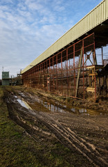 Fototapeta premium Detailed view of he long conveyor system used to transport mined aggregates away to an out of view processing facility.