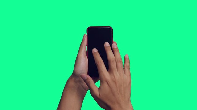 スマホを使う手 クロマキー合成用グリーンバック