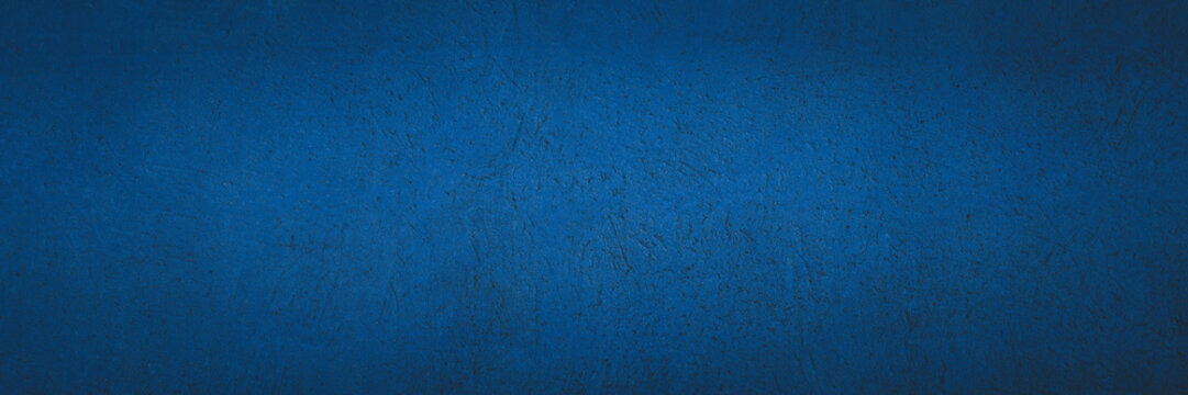 Old navy blue color concrete wall texture as background