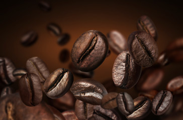 Roasted coffee beans on grey background, closeup