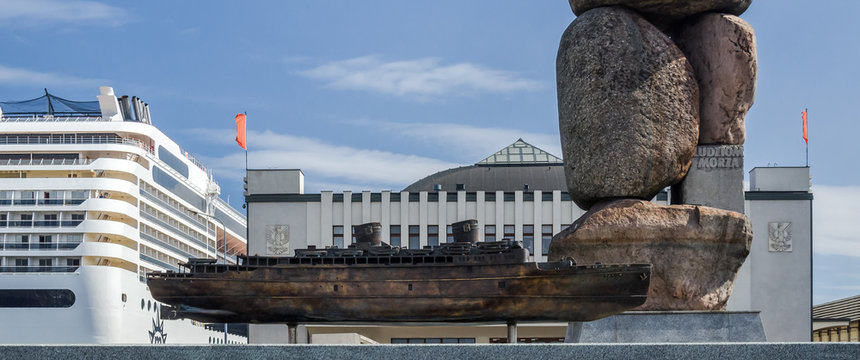 GDYNIA, POMERANIAN REGION / POLAND - 2019: A miniature of the Legendary Polish passenger transatlantic ship MS BATORY in front of its home port, monument and museum of emigration.