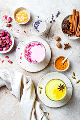Variety of Moon Milk for a better sleep. Turmeric golden milk, pink rose milk and lavender moon milk. Trendy relaxing bedtime drink