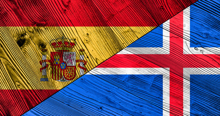 Flags of Iceland and Spain on wooden boards