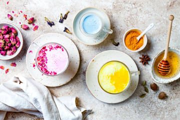 Variety of Moon Milk for a better sleep. Turmeric golden milk, pink rose milk, blue butterfly pea...