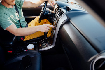Guy listening to music in car stock photo