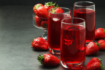 Glasses with strawberry drink with ice	