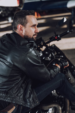 Caucasian adult man is ready for motorbike racing © Yakobchuk Olena