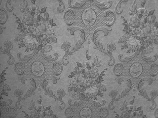 Beautiful abstract color white and gray flowers surface on white granite texture on white wall and white and black granite tiles floor pattern