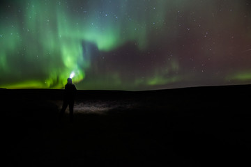 Naklejka na ściany i meble Northern lights in north Iceland