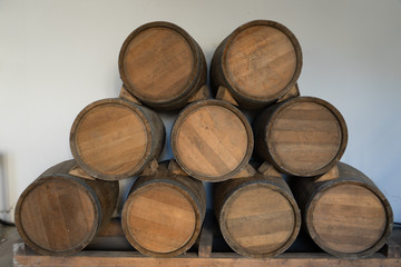 Wine barrels in the vault of winery