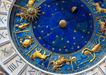 Astrology Zodiac signs on ancient clock, detail of medieval clocktower Torre dell'Orologio, Venice,...