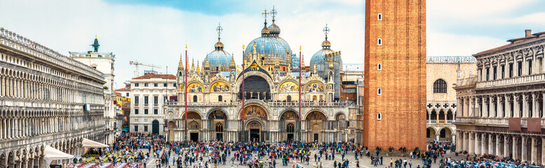 San Marco Square, Venice, Italy. Panoramic view of St Mark's Basilica. It is top landmark of Venice. Panorama of famous tourist place in Venice city and Europe. Renaissance architecture of Venice.