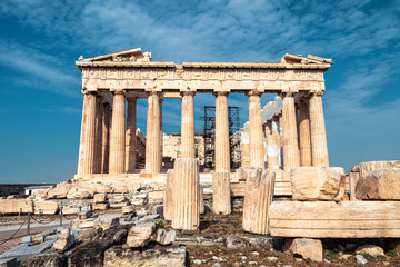 Ancient Parthenon temple on Acropolis, Athens, Greece. It is top landmark of Athens. Facade of famous Parthenon in Athens city center. Scenery of Greek ruins, remains of classical Athenian culture. 