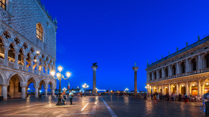 Venice at night, Italy. Panoramic view of famous St Mark`s Square or Piazza San Marco in evening. This place is top landmark of Venice. Renaissance architecture of Venice at dusk. Long exposure photo.