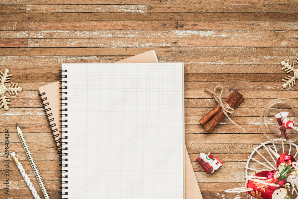 Aufkleber top view of blank notebook on grunge wood background with christmas decorations. mockup xmas backgro