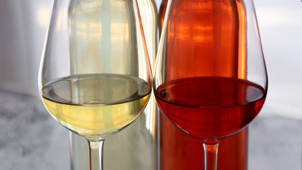 Close up of wine bottles and glasses. Beautiful abstract wine background.