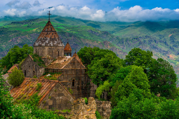 Stone ancient monastery Sanahin - a landmark of Armenia on the background of beautiful mountains