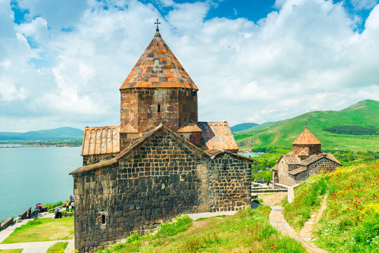 Beautiful view of Sevanavank Monastery and Lake Sevan, sightseeing in Armenia in summer