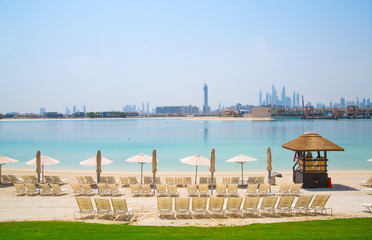 Dubai city skyscrapers view from the beach at the Palm Jumeirah. Dubai, UAE