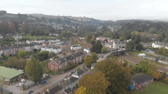 Town of Totnes (Devon, UK), aerial drone footage showing houses, railway & train station