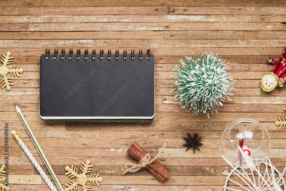 Aufkleber top view of blank notebook on grunge wood background with christmas decorations. mockup xmas backgro