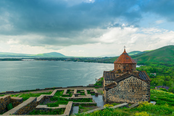 Heavy rain cloud at the Sevanavank monastery and Lake Sevan, beautiful landscape of Armenia
