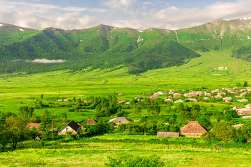 Picturesque landscapes of Armenia, high mountains and green meadows on a sunny summer day