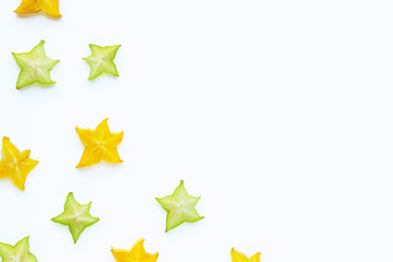 Ripe star fruit on white background.