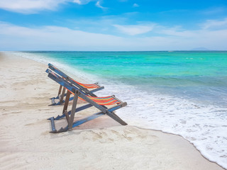 Fototapeta na wymiar sun chair on beach