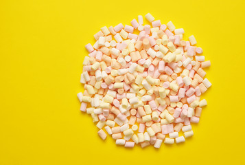Marshmallow on colorful background.