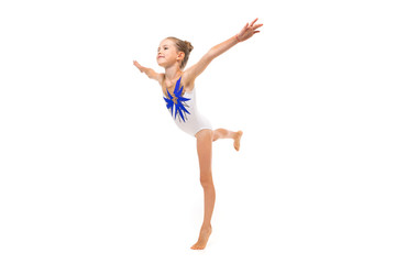 girl gymnast in white trico in full height performs in a white jump isolated on a white background