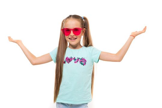 picture of a girl with two pony tales, pink sunglasses is smiling isolated on white background