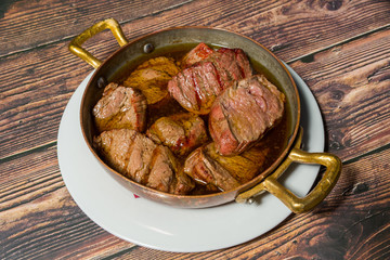 Grilled steak in olive oil