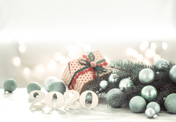 Fototapeta na wymiar Happy New year festive background with Christmas tree and Christmas balls.
