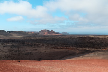 Black and red mountains in volcanic landscape