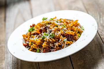 Pasta with sauce and sun-dried tomatoes