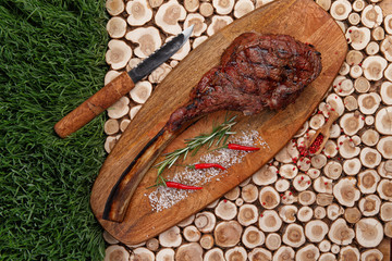 cooked TOMAHAWK STEAK
