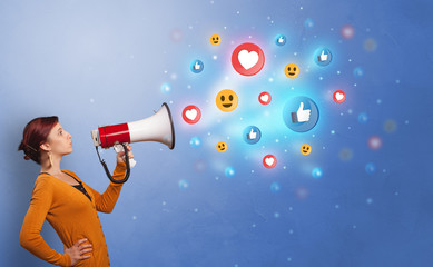 Person holding megaphone and yelling with social media concept