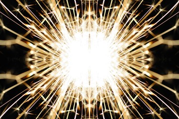 Close-up golden sparks fly from a holiday candle