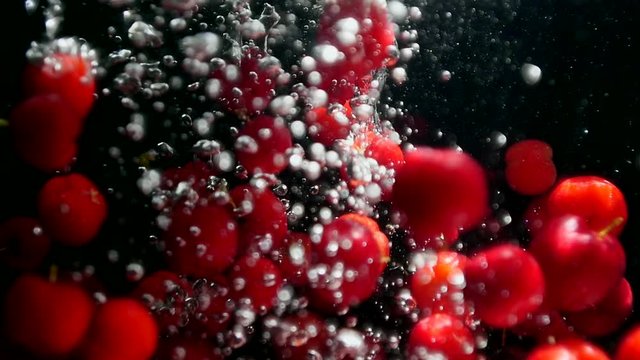 Falling Red Berries Slow Motion. Fruits. Healthy Food. Organic