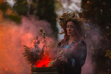 Woman sitting in burning pentagram circle, magic.