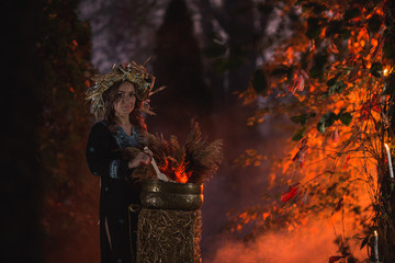 Woman sitting in burning pentagram circle, magic.