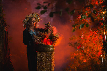 Woman sitting in burning pentagram circle, magic.