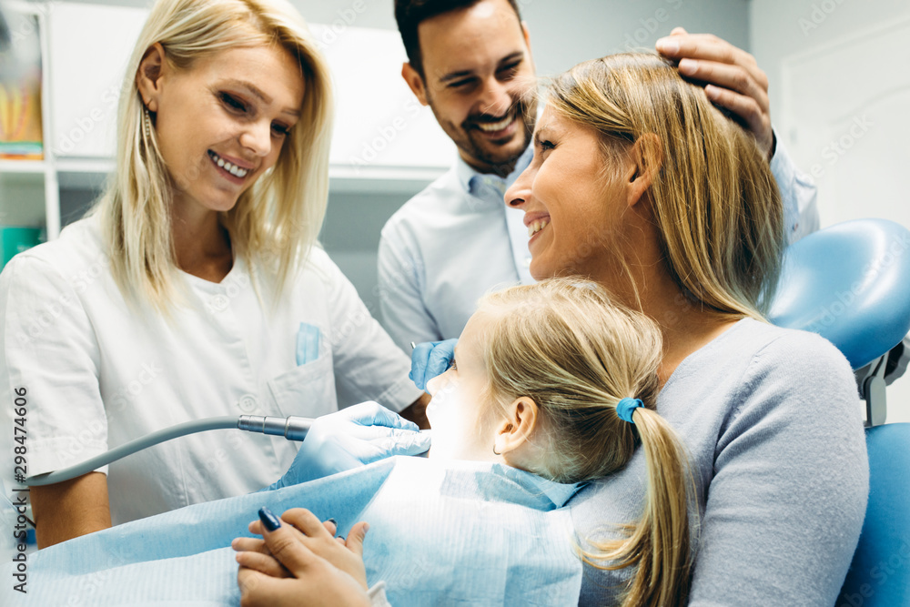 Wall mural family in dentist office