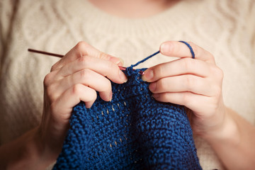 Close up of hands knitting