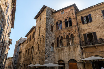 Fototapeta na wymiar San Gimignano Siena Tuscany Square of the cistern Tortoli palace