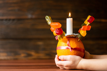 Orange Christingle is a symbolic object used in the Advent, Christmas and Epiphany services of many Christian denominations